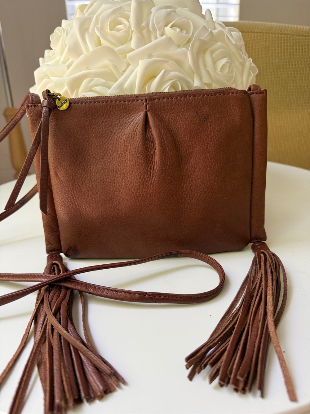 HOBO international Crossbody bag/purse, brown leather fringe press, hardware